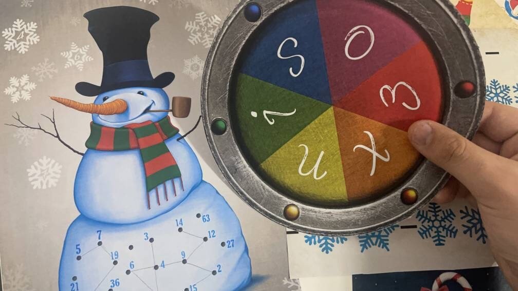 DIY holiday mystery game printable featuring Christmas-themed escape room challenges and festive clues.