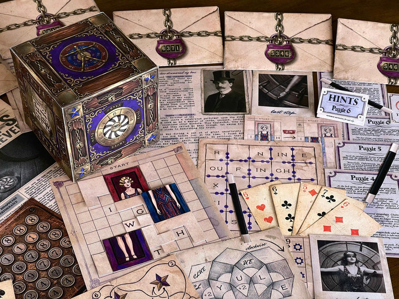 Side perspective of The Illusionist's Box showing the ornate 3D cube centerpiece surrounded by locked envelopes, newspaper articles, coded messages, playing cards, and puzzle pieces. Inspired by vintage illusionists and magical performances, this printable escape room for adults and teens provides a memorable game night experience full of logic, mystery, and hands-on interaction. A perfect date night activity and gift for puzzle lovers.