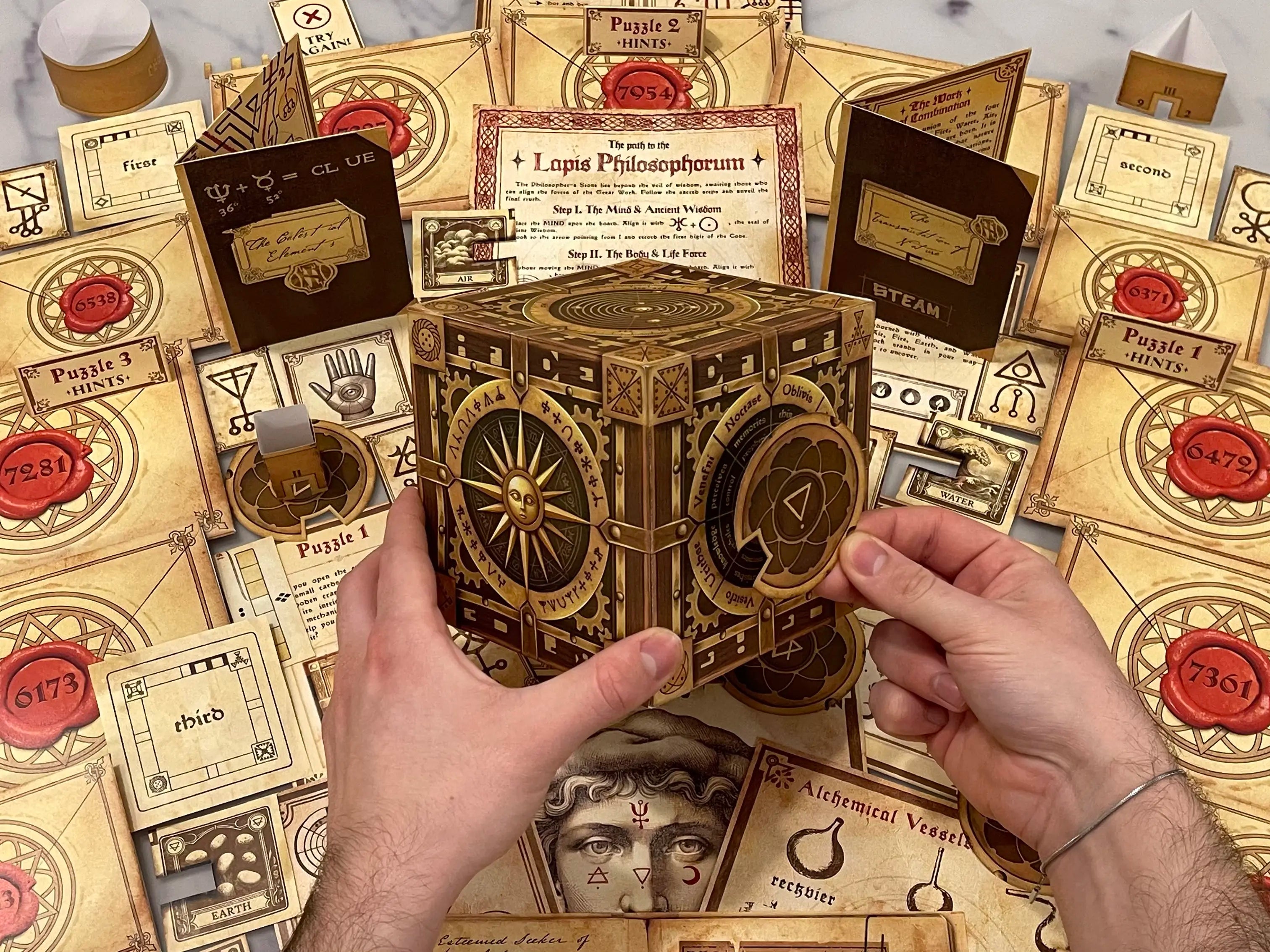 Experience the thrill of a DIY escape room with The Alchemist’s Box! This downloadable escape room lets you solve alchemy-themed puzzles and uncover hidden mysteries—all from home.