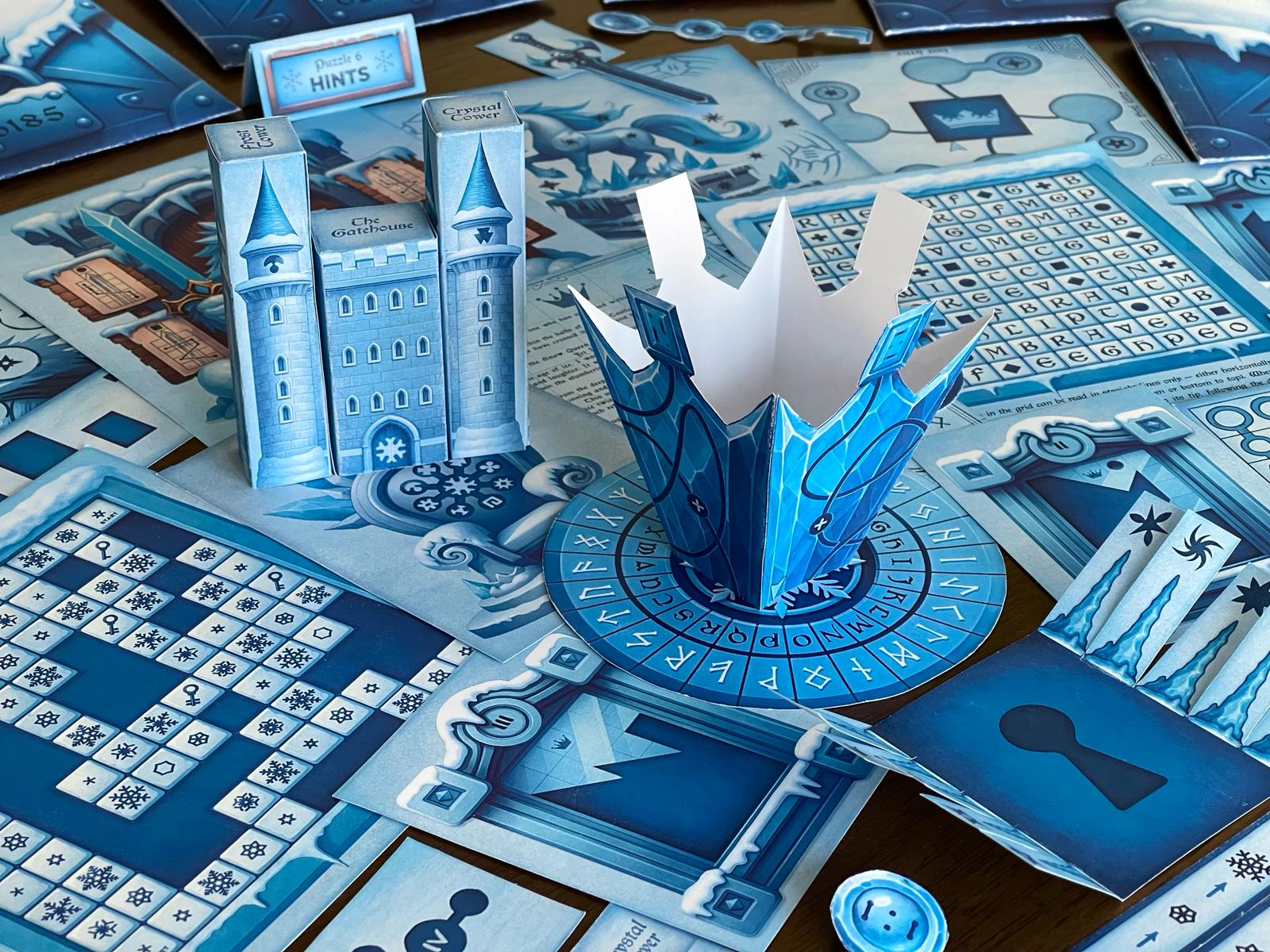 Icy blue paper castle and crown props from The Snow Queen printable escape room by MysteryLocks displayed among winter puzzles, word grids, and cipher wheels. This DIY escape room kit turns any home into a magical frozen world filled with logic puzzles, storytelling, and hands-on creativity. Perfect for families, teachers, or party hosts seeking an immersive, printable winter escape room experience inspired by fantasy and mystery.