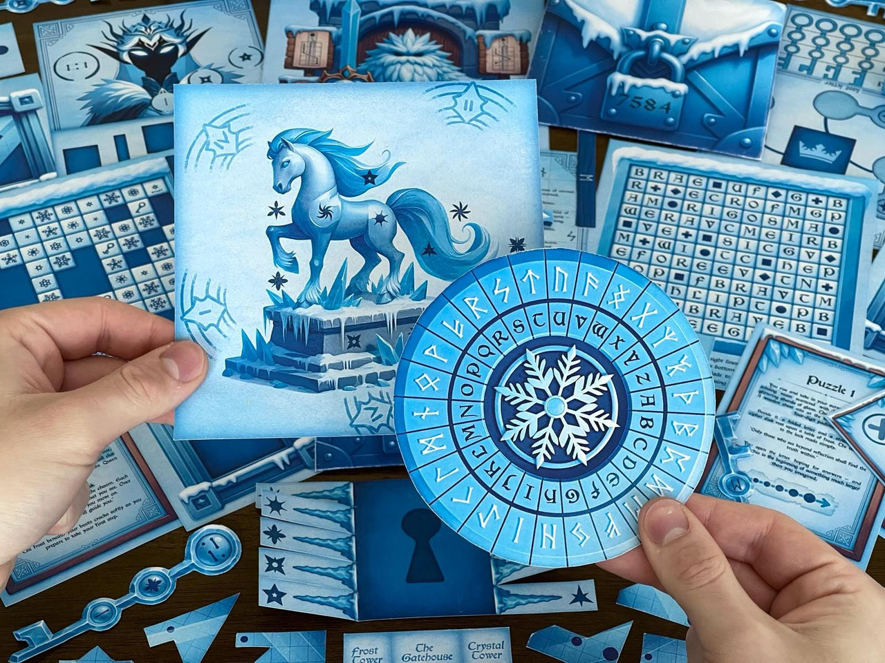 Hands holding icy blue puzzle pieces from The Snow Queen printable escape room by MysteryLocks — featuring a runic cipher wheel and an illustrated winter horse statue. Designed for families and puzzle lovers, this DIY escape room includes beautifully drawn clue cards, word grids, and logic puzzles. Perfect for creating a magical at-home escape adventure during winter, blending storytelling, mystery, and creative problem-solving for all ages.