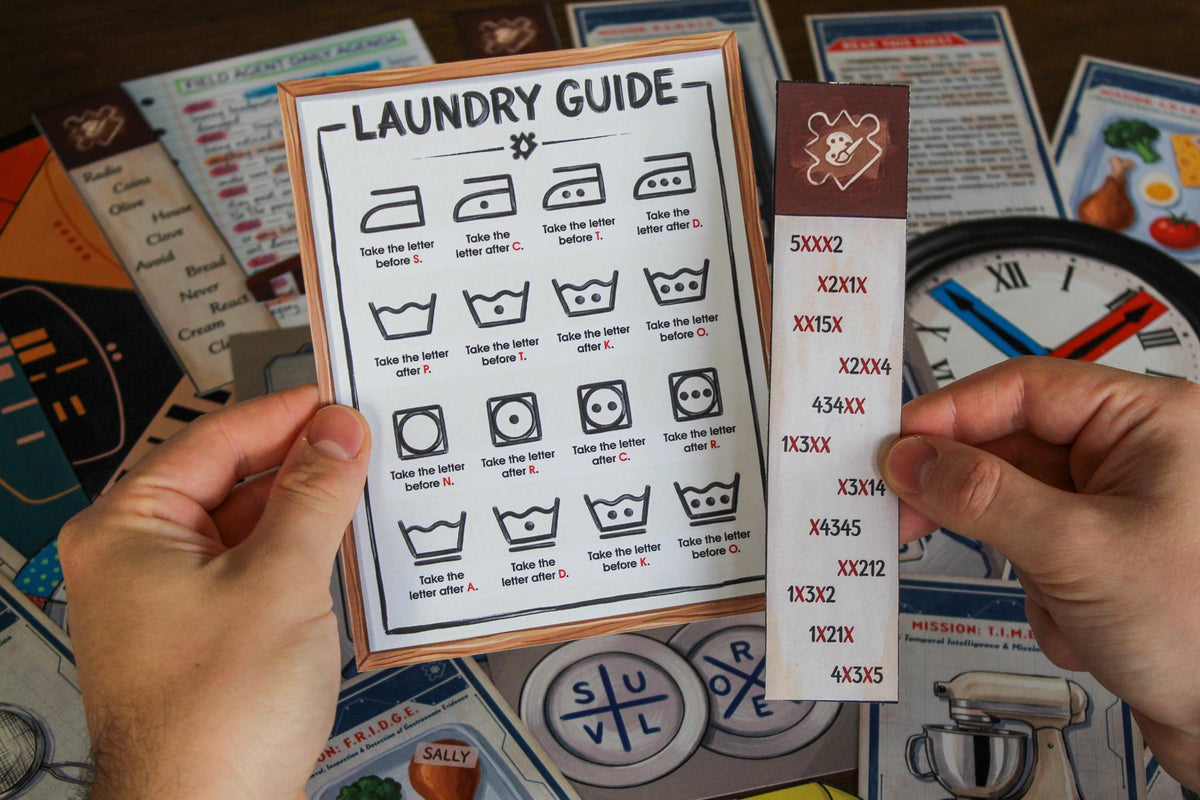 Hands holding the Laundry Guide and coded bookmark puzzle from Your Home Is an Escape Room, a printable escape room for kids, teens, and families. The surrounding spy-themed materials include the Field Agent Daily Agenda, remote control, clock, mission cards, and household clues. Players use laundry symbols, hidden letters, colors, patterns, and familiar objects to solve hands-on puzzles as their own home becomes an interactive secret-agent training mission.